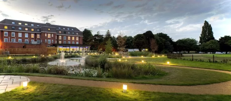 Secret garden and bar for team building activities in Teddington at The Lensbury Resort, a hotel on the River Thames with pools, leisure and conference facilities which are ideal for corporate events and corporate activities.