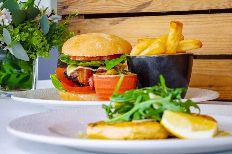 Burger and chips in the restaurant at The Lensbury