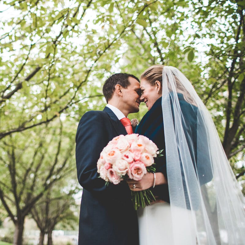 Couple having a private riverside wedding package at The Lensbury a wedding and reception venue near me