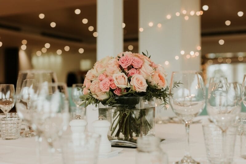 Vase with flowers at a wedding at The Lenbury