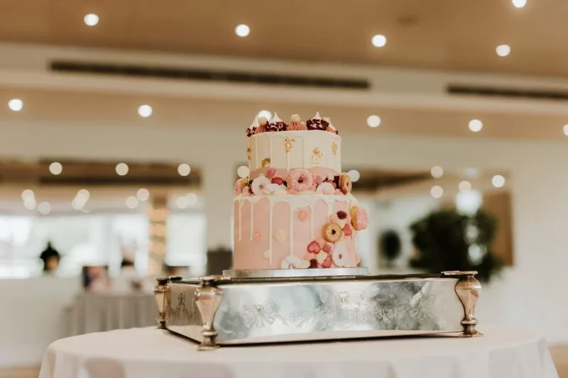 Wedding cake on table at The Lensbury wedding venue, providing riverside wedding and reception package venue near me