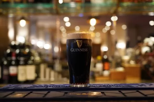 Pint of Guinness at The Lensbury bar for St Patrick's Day