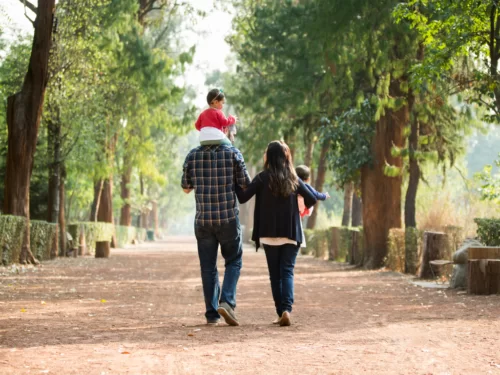 Family walking on one of south west London's top walks near The Lensbury in Teddington.