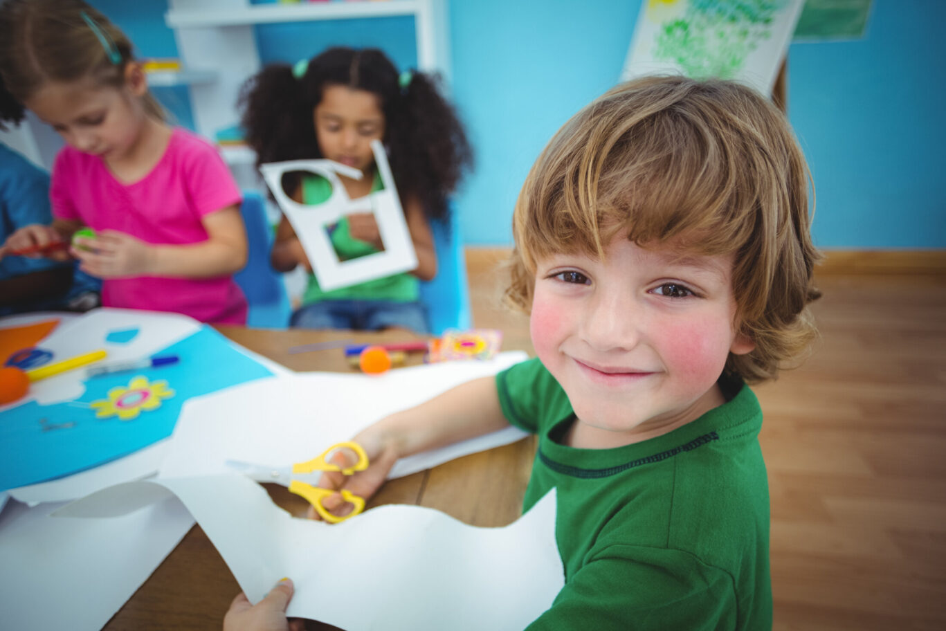 Happy,Kids,Doing,Arts,And,Crafts,Together,At,Their,Desk